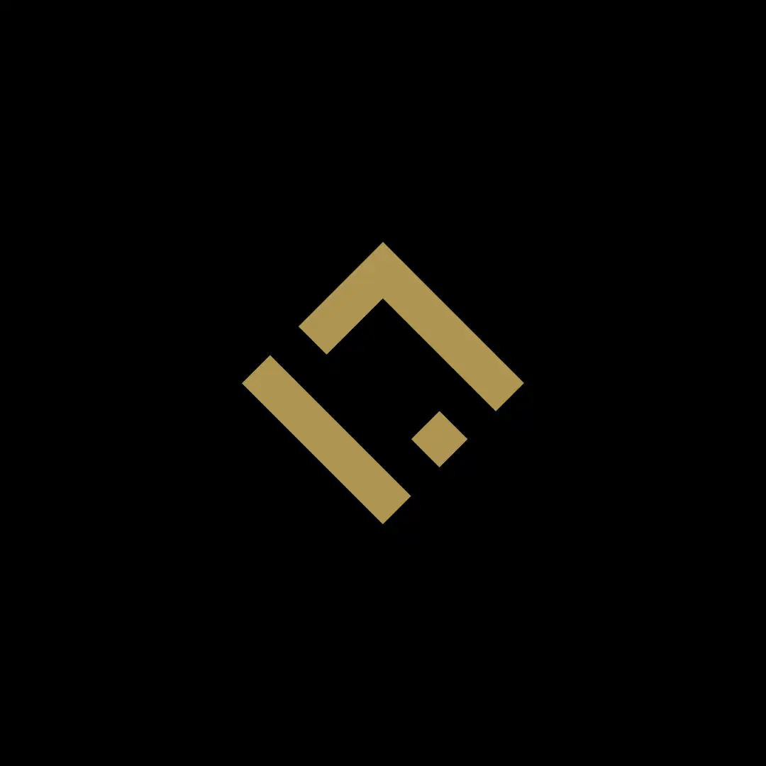 logo iconografico di luxuryilab oro su fondo nero